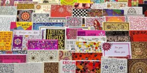 Colorful greeting cards stacked neatly.